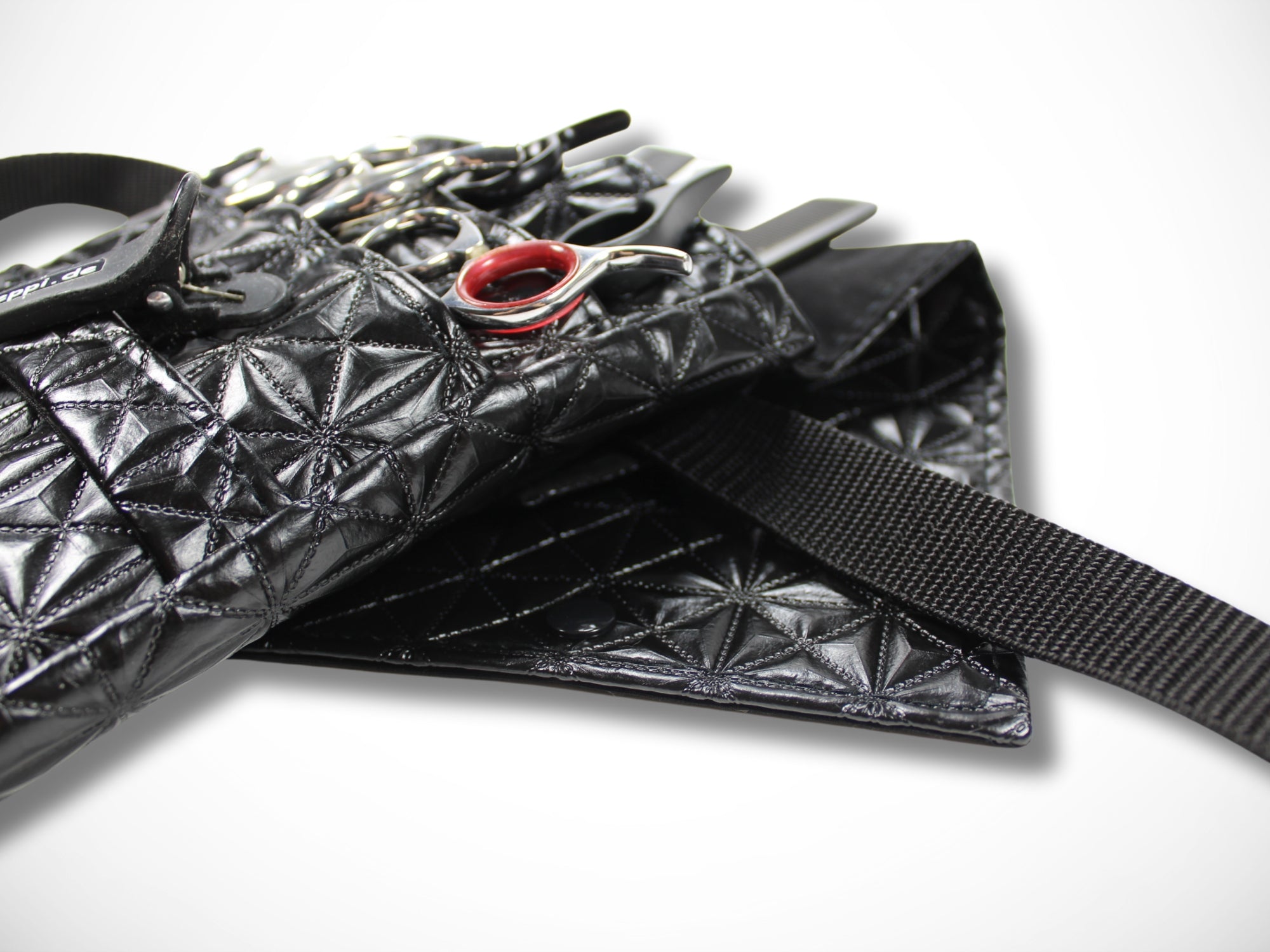 Schwarze Friseur Werkzeugtasche aus geprägtem Kunstleder für Friseurscheren im Friseursalon