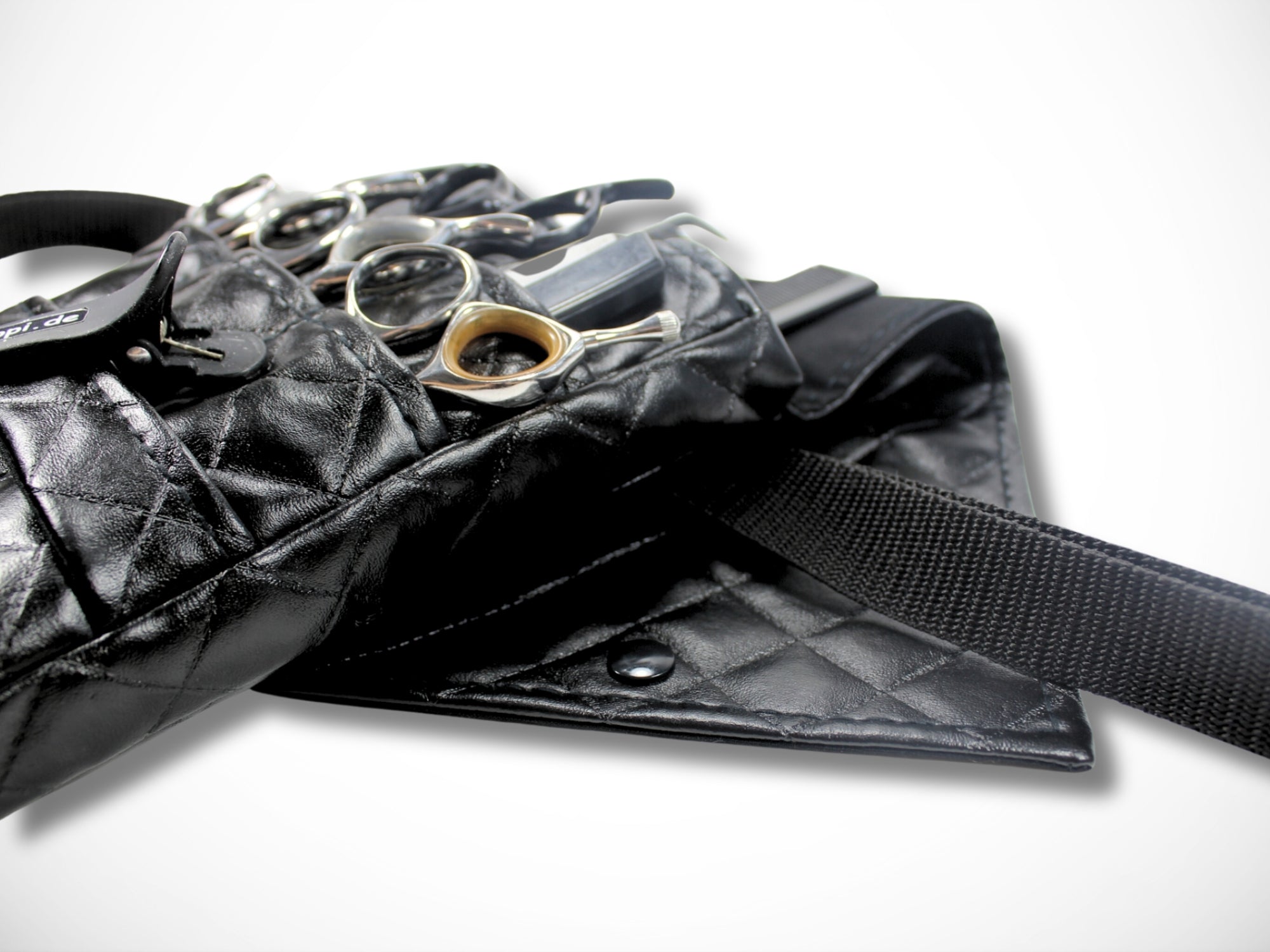 Schwarze Friseur Scherenasche aus gestepptem Kunstleder für Friseurin im Friseursalon Friseurwerkzeug