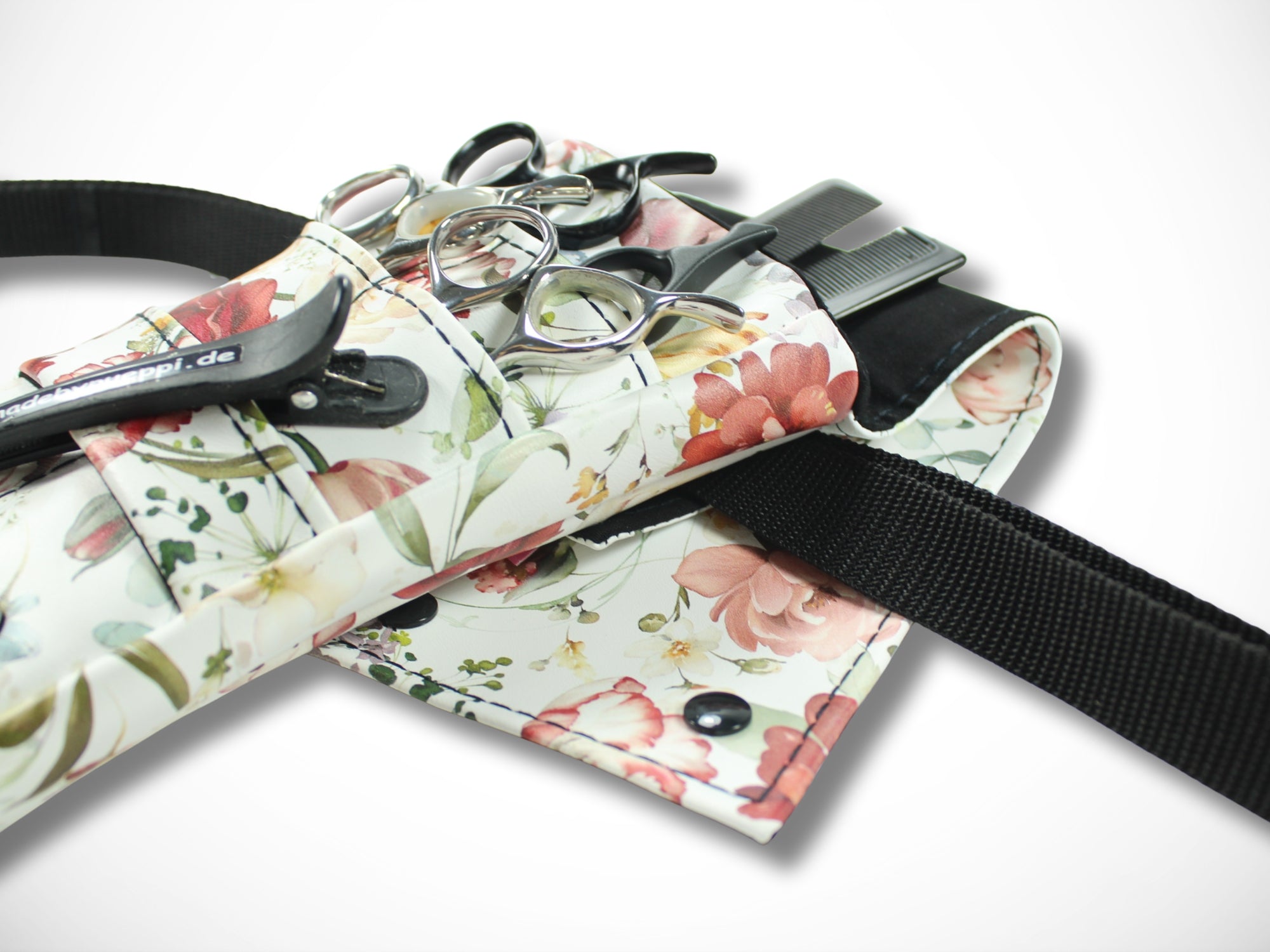 Kleine Friseurtasche aus Kunstleder mit Blumen für Friseurscheren im Friseursalon Werkzeugtasche