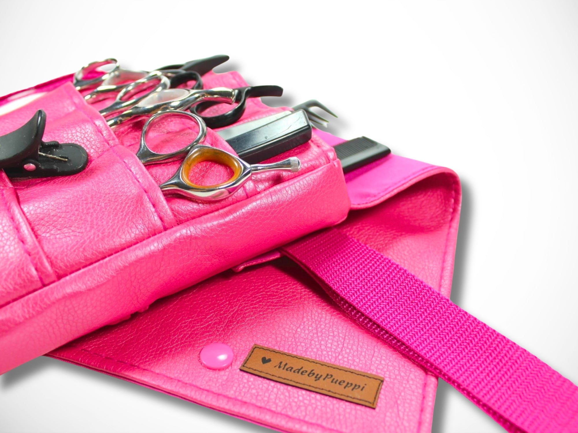 Pinke Kunstleder Friseurtasche für Friseurscheren im Friseursalon