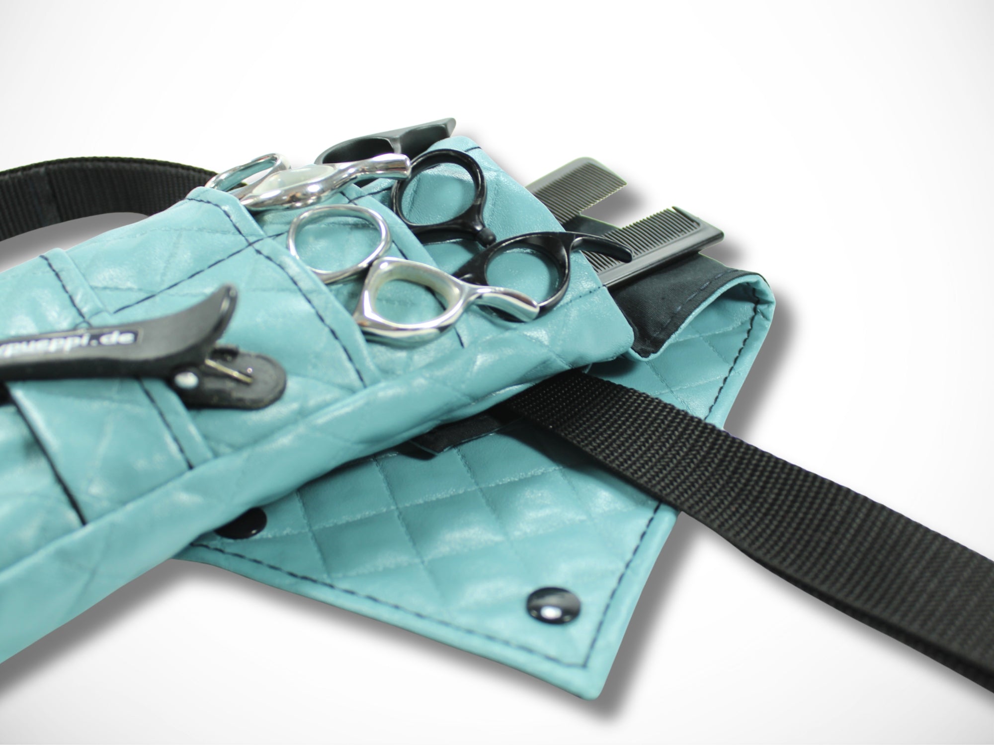 Kleine Friseur Werkzeugtasche aus abgestepptem Kunstleder in blau für Friseurscheren und Friseurwerkzeug im Friseursalon