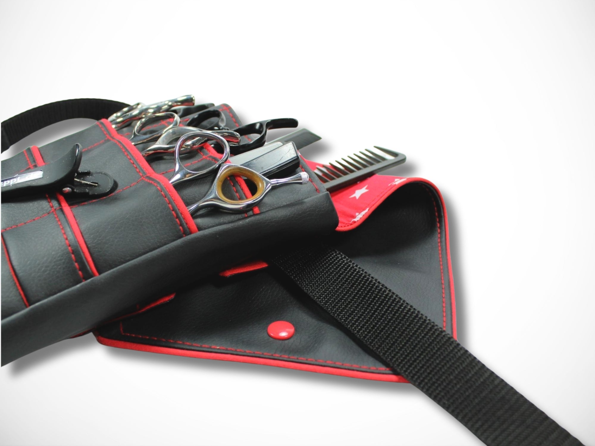 Friseurtasche aus schwarzem Kunstleder mit rotem Highlight und Sternen für Friseurscheren und Friseurgürteltasche